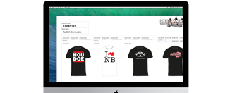 Digitale drukproef op een beeldscherm met bedrukte T-shirts